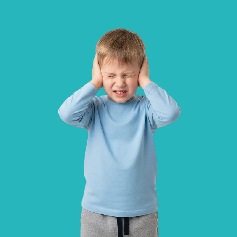 what are the symptoms of tinnitus in children and how is it treated? 