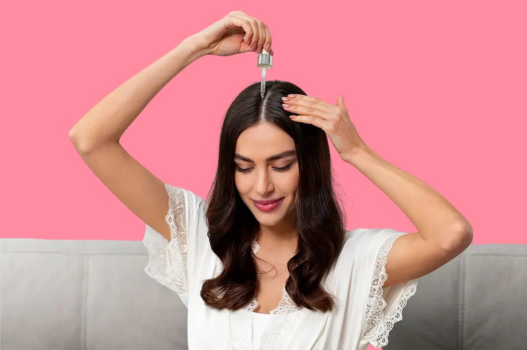 Warm oil bath to nourish hair roots