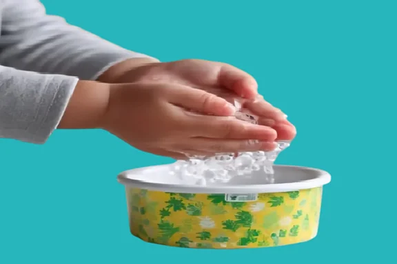 Soaking hands in salt water to treat excessive sweating in children
