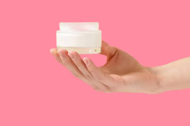 Moisturizing the feet to treat cracked heels