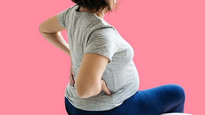 Lower back pain is one of the signs that indicate natural childbirth